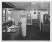 Cook in the galley of the towboat "Stanolind A"